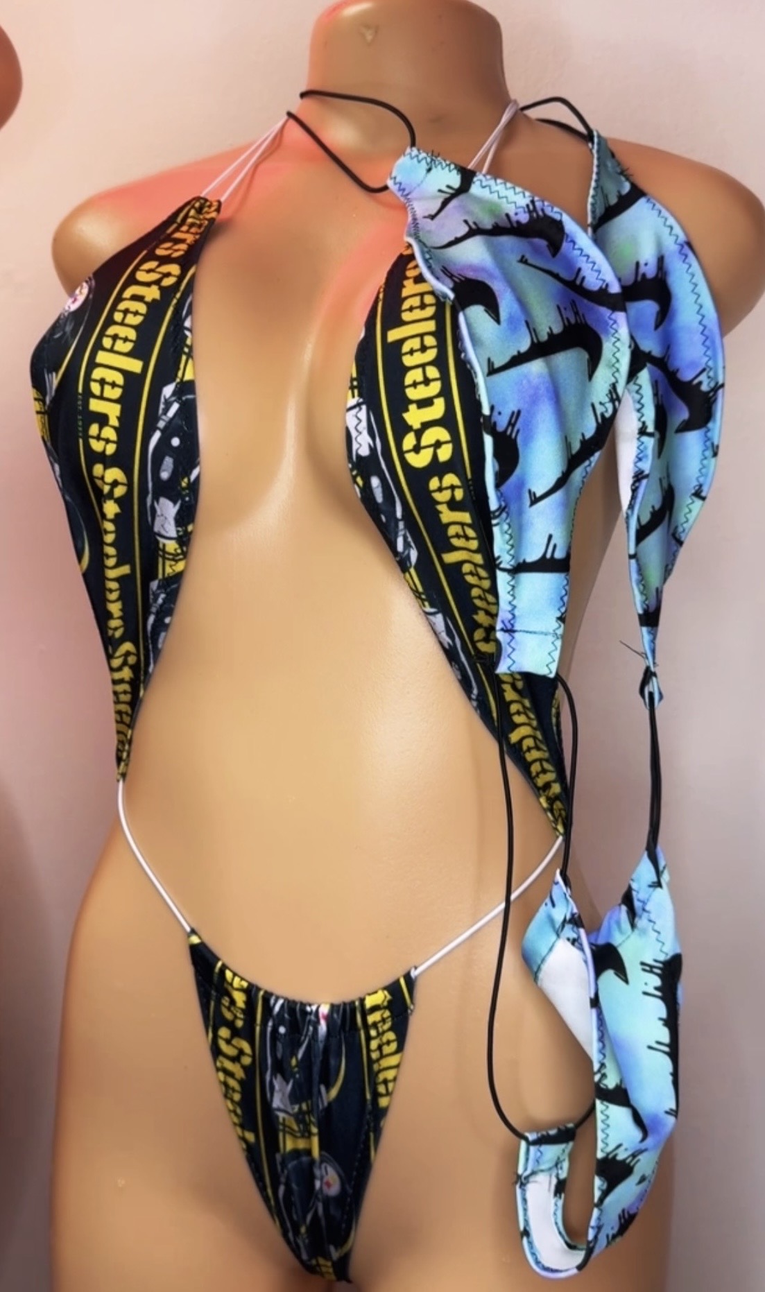 Black and gold sling shot one-piece by JaszItUp BagFitsz